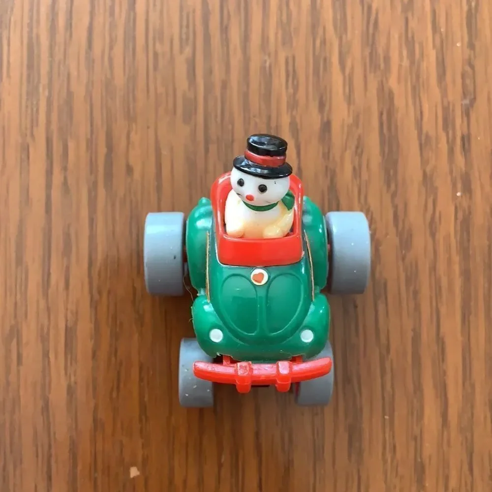 2 plastic wind up Christmas snowmen‎